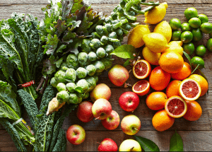 a group of fruits and vegetables on a wood surface Healthy Weight Loss Diets Allesley